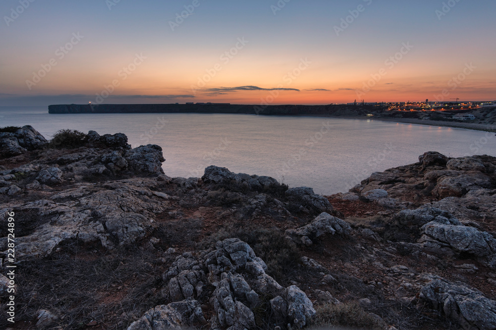 view from cliff rocks at sunset in portugal algarve