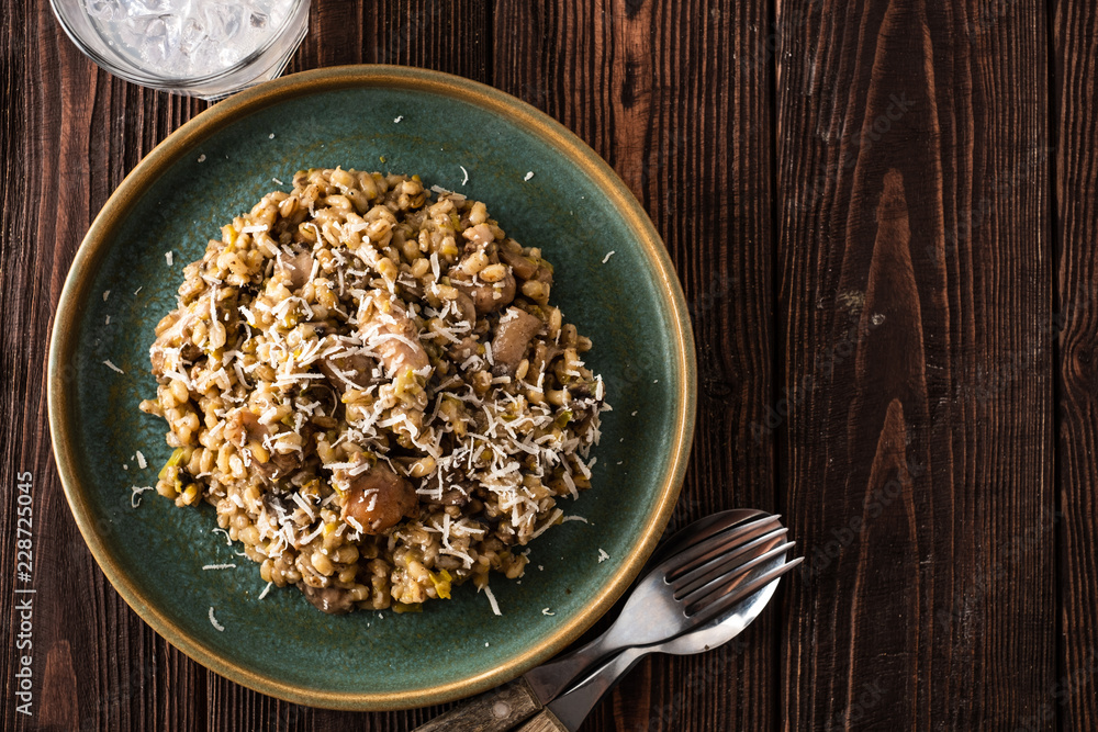Barley porridge with mushrooms and chicken, top view Barley porridge with mushrooms and chicken, top view
