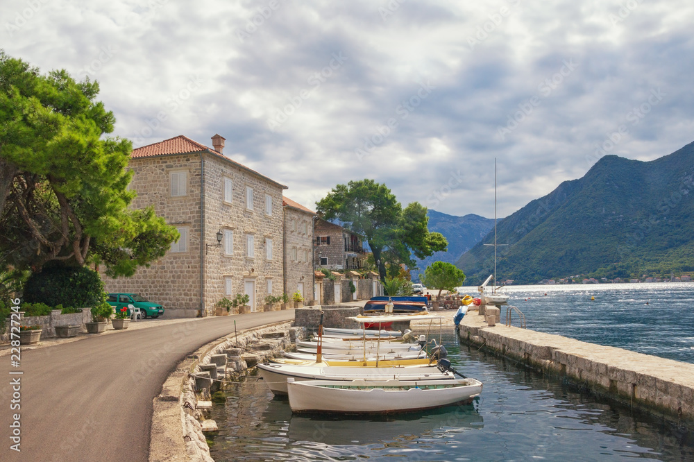Obraz premium Cloudy autumn day in ancient town of Perast. Montenegro, Adriatic Sea, Bay of Kotor