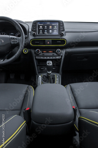 central console with manual gearstick and infotainment monitor