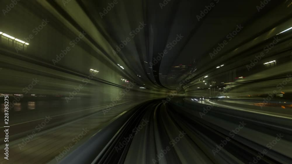 Time Lapse of train moving through city at night, internet connectivity Time Lapse of train moving through city at night, internet connectivity