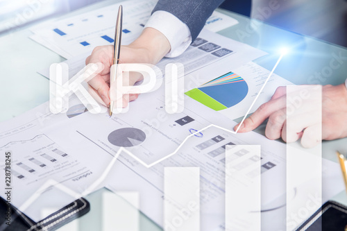 KPI - Key performance indicator graph on blurred background.