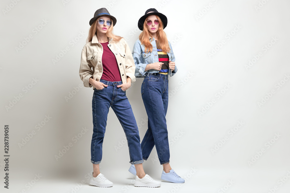 Two Girls Fooling Around. Fashion Autumn Outfit