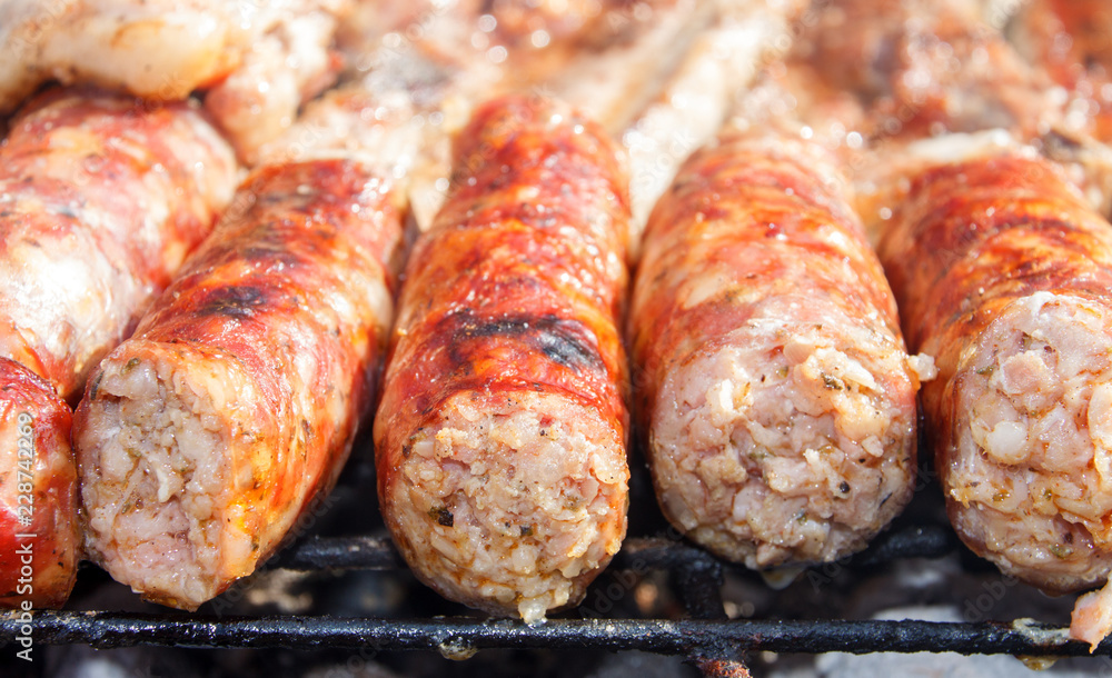 Close up of sausages on barbecue