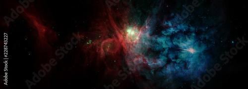 Landscape background of fantasy alien galaxy with red and blue glowing clouds and stars. The elements of this image furnished by NASA.