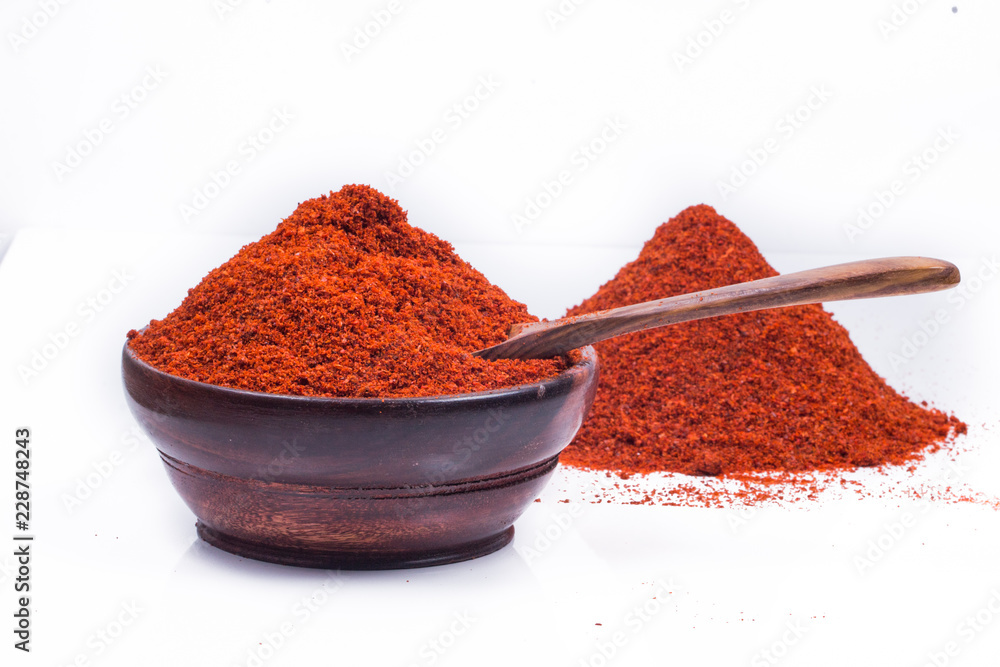 red chili powder isolated on white background red chili powder isolated on white background