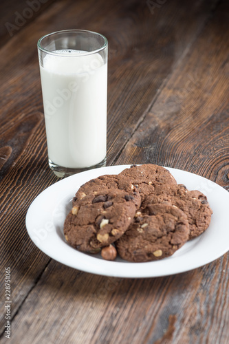 Chocolate cherry cookies and a glass of milk