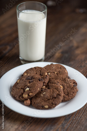 Chocolate cherry cookies and a glass of milk