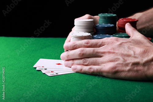 Player's hands collecting all winnings photo