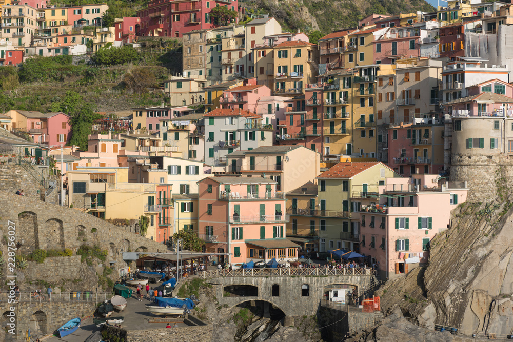 Scenic view of colorful village Manarola and ocean coast in Cinque Terre, Italy