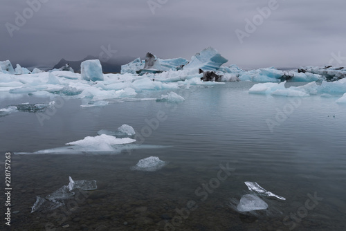 Big blue icebergs in Jokulsarlon glacial lagoon, South Iceland