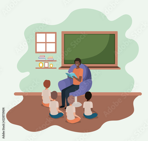 black man reading book in the sofa with kids