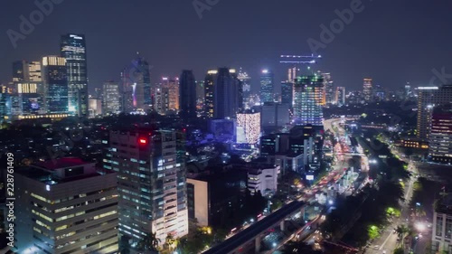 Wallpaper Mural JAKARTA, Indonesia - October 19, 2018: Beautiful aerial hyperlapse of skyscrapers at night with night traffic and beautiful night lights. Shot in 4k resolution Torontodigital.ca