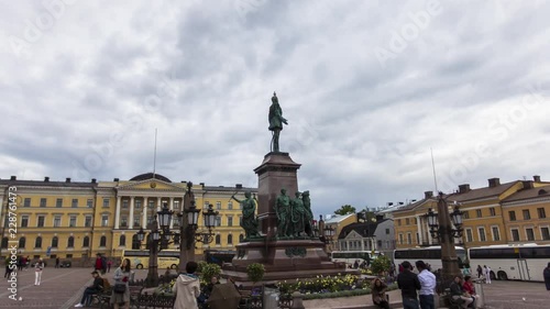 Wide shot of tourists visiting at Helsinki Senate Square and Helsinki Lutheran Cathedral, Helsinki, Finland