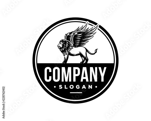 Fototapeta Naklejka Na Ścianę i Meble -  Vintage Circle Vector Hand Drawn Animal King of the Jungle Lion with Wings Sign Symbol Company Logo Template Design Inspiration