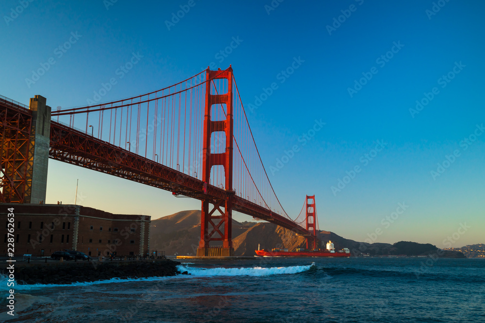 Suns setting Behind Golden Gate Bridge, Fort Point, San Francisco