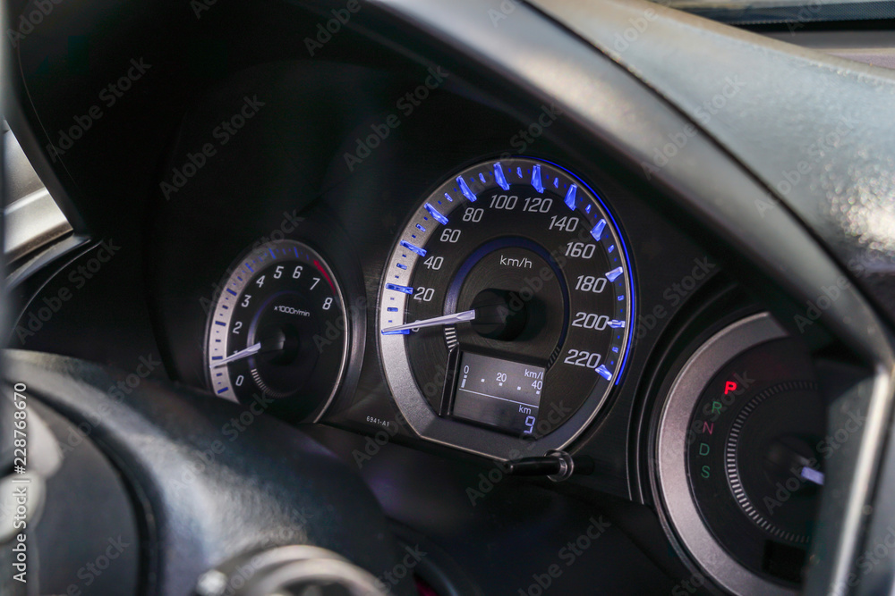  Speed meter is gauge that measurement and display,Closeup dashboard of mileage car with light blue