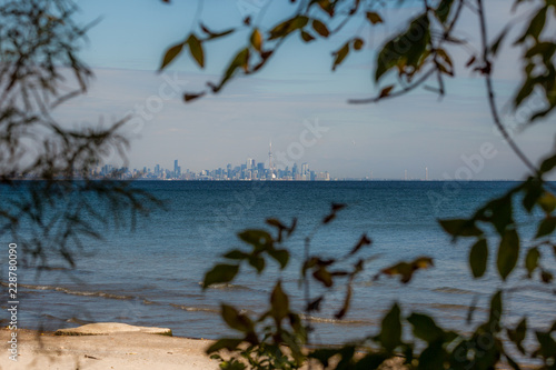 Toronto, CANADA - October 16, 2018: Panoramic view of the city of Toronto across Lake Ontario from the park in Mississauga photo