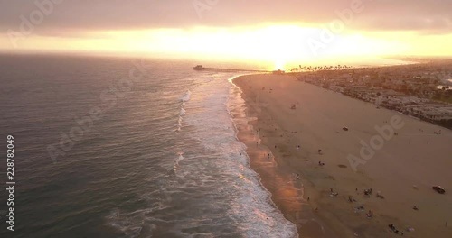A flight over a Southern California Beach at sunset. photo