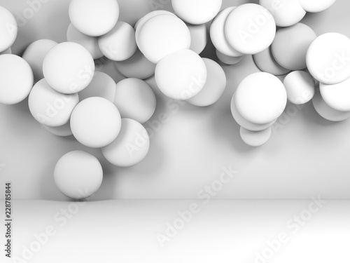 Group of white round objects in empty room