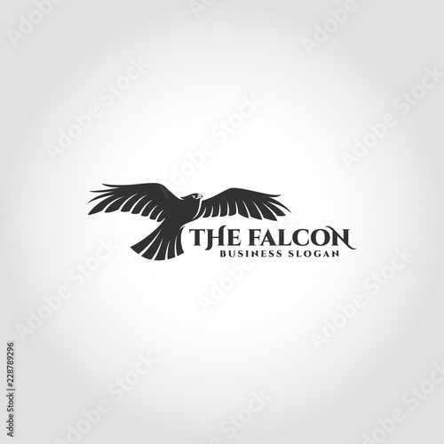The Falcon is a bird logo with flying falcon concept фототапет
