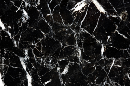 White patterned detailed of black marble pattern texture for interior, product and other design. abstract dark background. photo