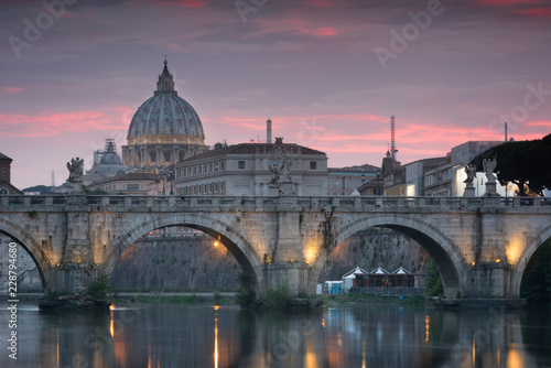 Vatican City, Rome, Italy, Beautiful Vibrant Night image Panorama of St. Peter's Basilica, Ponte St. Angelo and Tiber River at Dusk in Summer. Reflection of The Papal Basilica of St. Peter