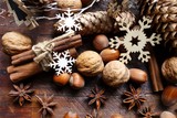 Decorative Christmas , nuts, cinnamon and anise stars.   Christmas time . Seasonal and holidays concept

