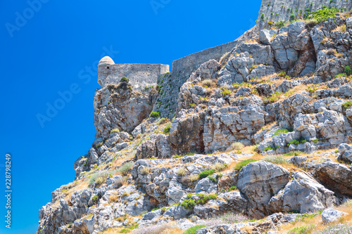 The venetian fortress of Fortezza on the hill at the old town of Rethimno, Crete photo