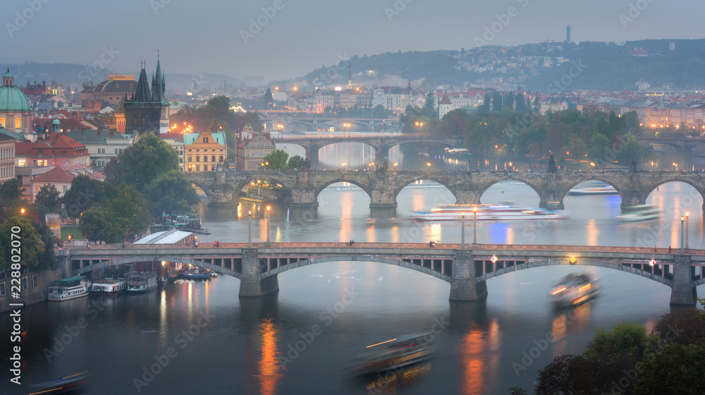 Famous iconic image of Charles bridge, Prague, Czech Republic. Concept of world travel, sightseeing and tourism.