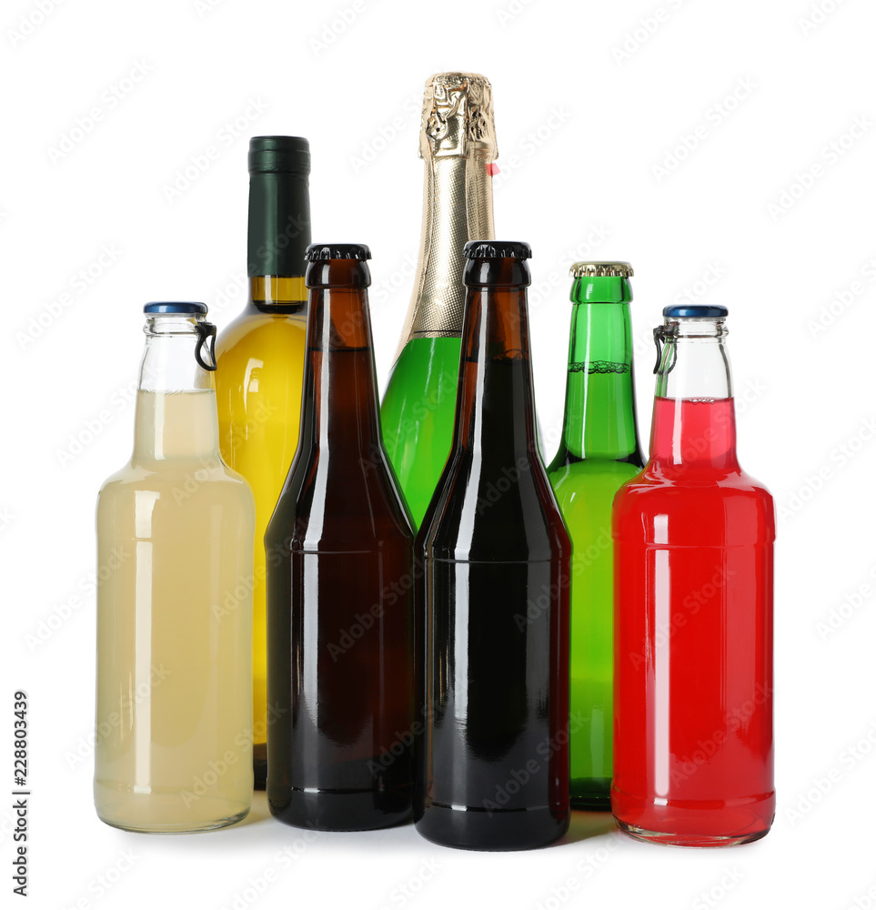 Bottles with different alcoholic drinks on white background Bottles with different alcoholic drinks on white background