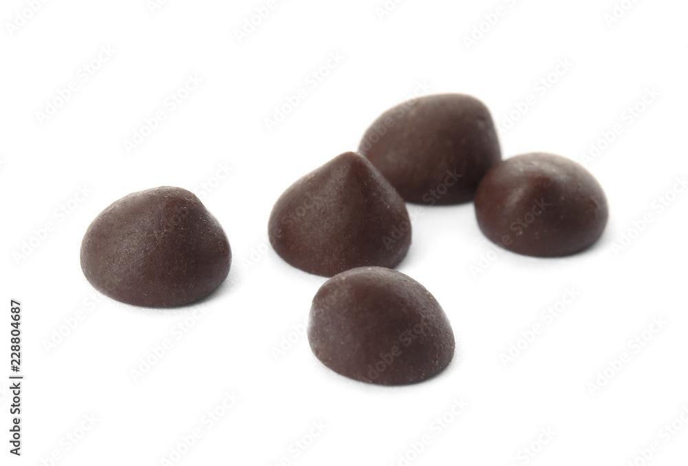 Delicious dark chocolate chips on white background Delicious dark chocolate chips on white background