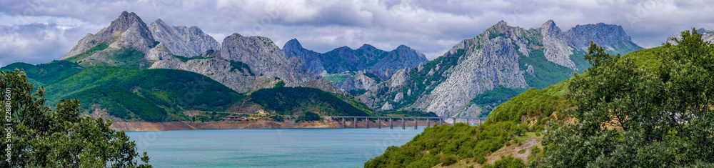 Reservoir in the mountains of Picos de Europa. Cantabrian, Riano, province of Leon. Castile and Leon, northern Spain Reservoir in the mountains of Picos de Europa. Cantabrian, Riano, province of Leon. Castile and Leon, northern Spain