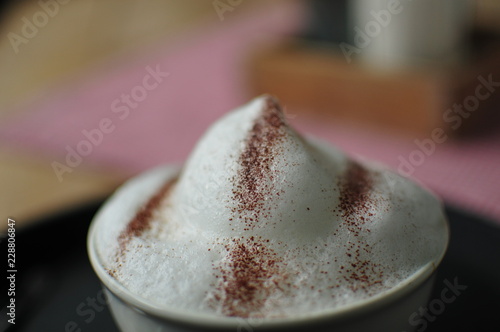 Принти на полотні Milk foam cap on a Cappuccino with chocolate powder and fuzziness