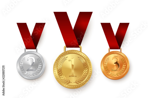 Gold, silver and bronze medals hanging on red ribbons isolated on white background. Vector design element.