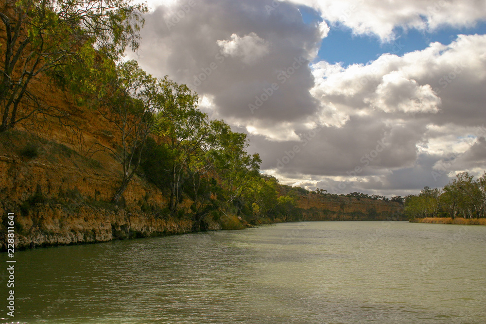 Landscape view of sandstone cliffs on the banks of the Murray River in South Australia. Landscape view of sandstone cliffs on the banks of the Murray River in South Australia.