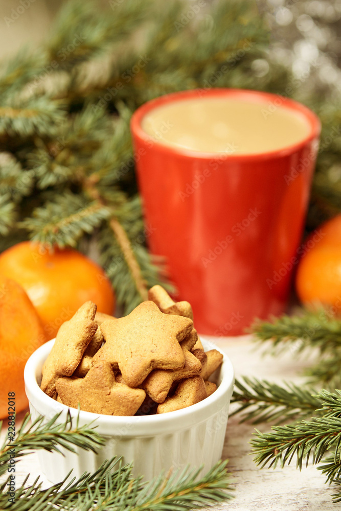 Gingerbread Cookie. Cup of coffee. Spruce branch. Orange tangerines. NewYear