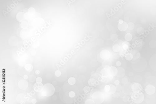 White and grey abstract bokeh background Christmas and Happy new year on blurred bokeh