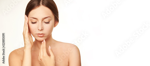 Healthy woman face. Young girl hand concept. Lotion cosmetics