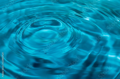 water drops on blue surface