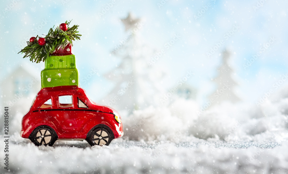 Red toy Santa's car with gifts