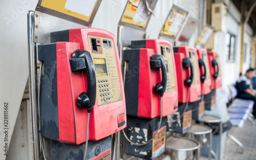 Wallpaper Mural Thai old public phone booth orange color for coins or card use. Torontodigital.ca