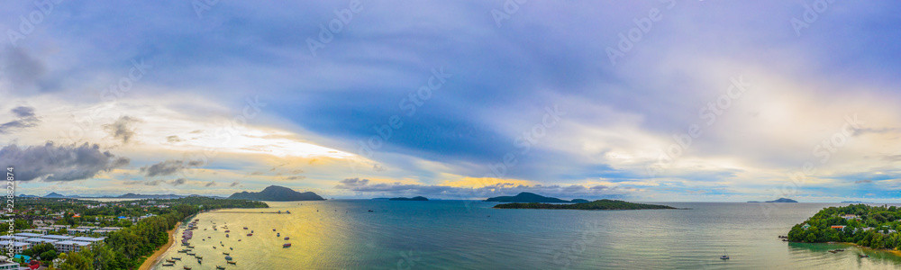 aerial view panorama Phromthep cape and wind tubine viewpoint. .Phromthep cape is a famouse landmark and popular sunset viewpoint of Phuket Thailand.