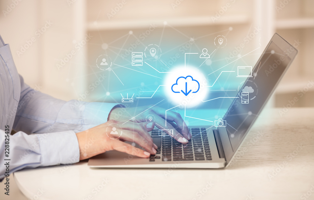 Business woman in homey environment using laptop with online storage and cloud technology concept
Business woman in homey environment using laptop with online storage and cloud technology concept