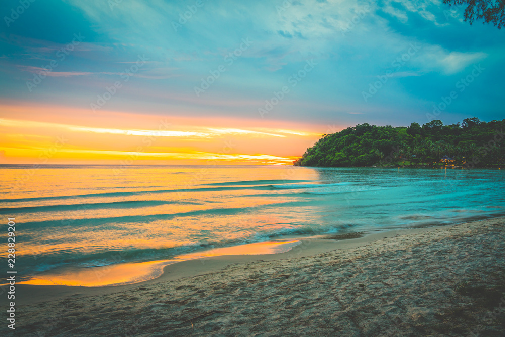 Fototapeta premium Sunset at beach sea sky clouds twilight time