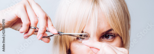 Bild auf Leinwand Blonde girl cut forelock