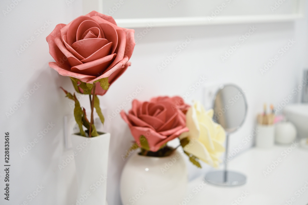 Decoration details in modern wellness center with flower vase and candles. Decoration details in modern wellness center with flower vase and candles.