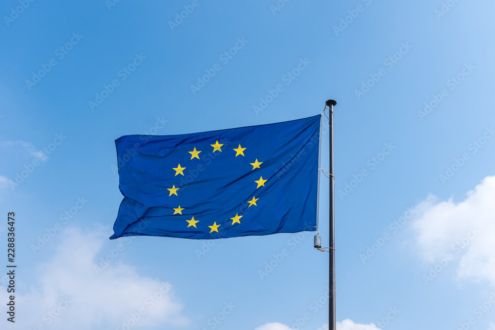 Flag of  European Union against blue sky