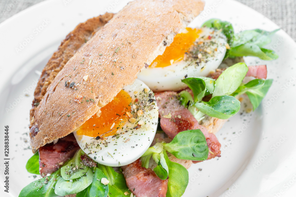 Sandwich with eggs and bacon Sandwich with eggs and bacon