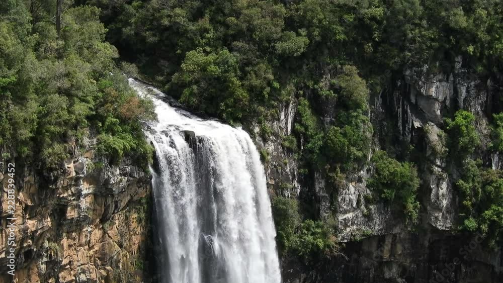 4k mid shot of the amazing waterfall at Canela in Southern Brazil, surrounded by the protected 4k mid shot of the amazing waterfall at Canela in Southern Brazil, surrounded by the protected